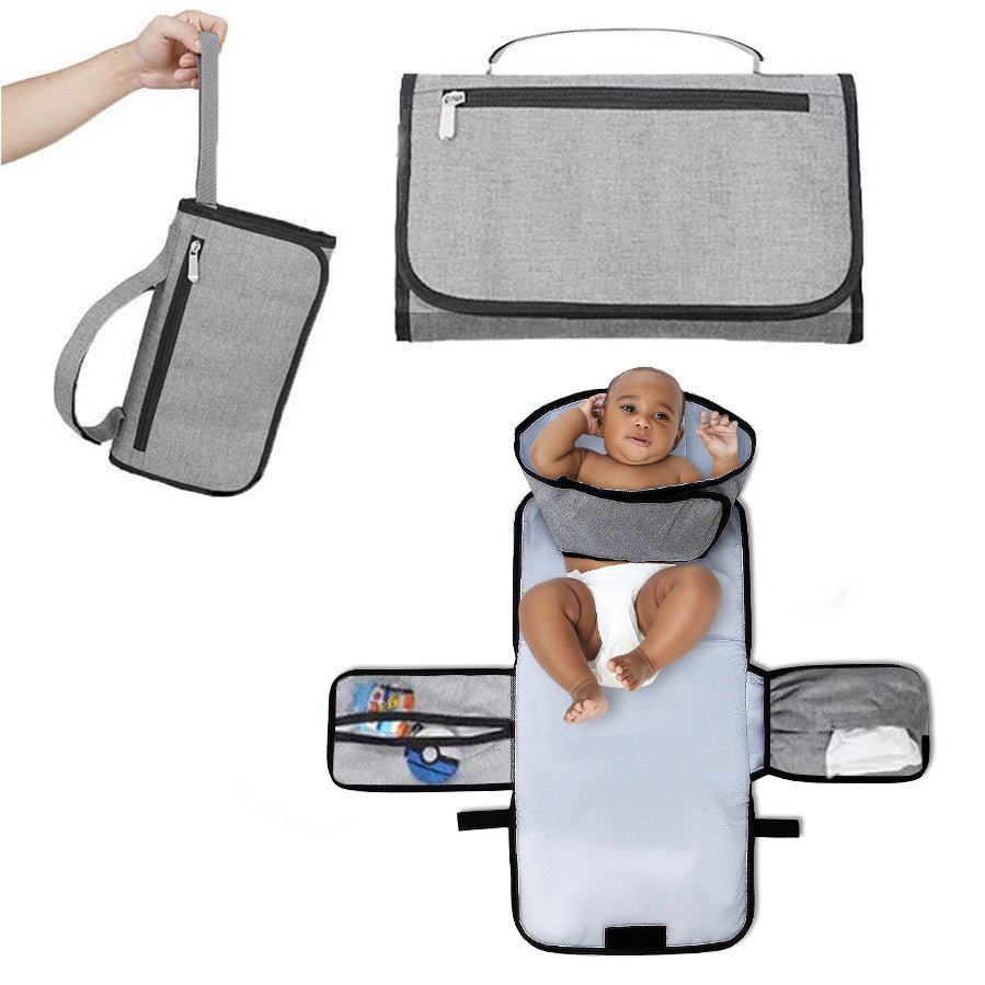 The Portable Diaper Changing Pad with Clean Hands Barrier